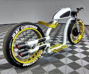 Custom retro electric cruiser in white and yellow, rear three-quarter view